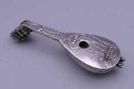 A 19th century Dutch novelty silver scent bottle formed as a mandolin, with English import marks.