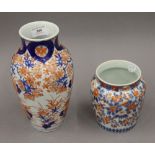 Two Japanese Imari vases. The largest 25 cm high.
