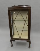 An early 20th century glazed display cabinet. 57 cm wide, 124 cm high, 29 cm deep.