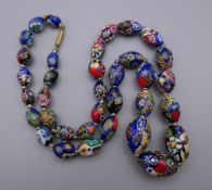A Venetian glass bead necklace. 60 cm long.