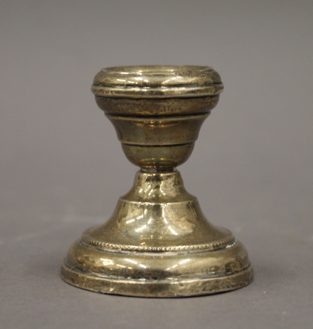 Two pairs of silver dwarf candlesticks. The largest 6.5 cm high. 11.2 troy ounces loaded. - Image 8 of 8