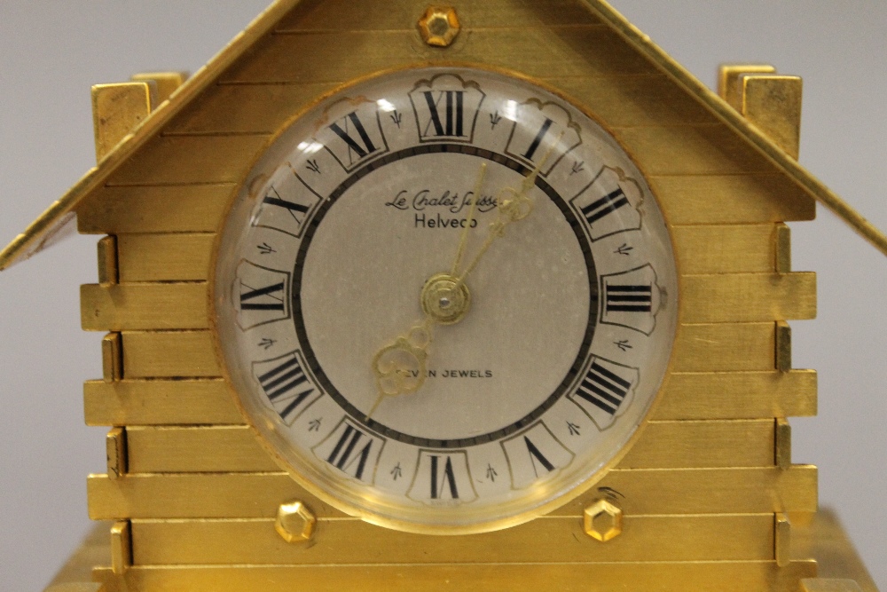 A brass cased Swiss desk clock formed as a Chalet. 11 cm high. - Image 4 of 5