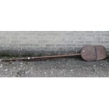 Two antique baker's shovels. The largest 200 cm long.