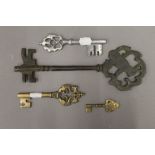 Four various keys. The largest 28 cm long.