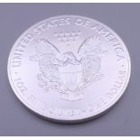 A 2019 USA silver dollar coin