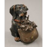 A painted bronze dog form inkwell. 11 cm high.