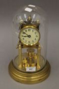 A Gustav Becker 400 day clock under glass dome. 28 cm high.