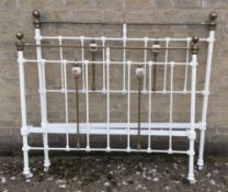 A brass and iron double bed