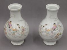 A pair of 19th century Chinese or Japanese porcelain vases. Each 22 cm high.