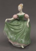 Two Royal Doulton porcelain figurines, Michele NN2234 and Poppy Eyebright.
