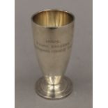 An 830 silver engraved cup. 11.5 cm high. 60.6 grammes.