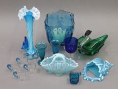 A quantity blue and green glassware.