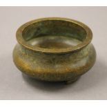 A small Chinese bronze censer. 8 cm diameter.