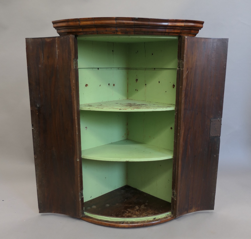 A George III mahogany bow front corner cupboard. 99 cm high. - Image 3 of 6