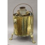 A brass log bucket, copper and brass pans, etc. The former 45.5 cm high.