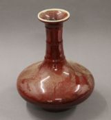 A Chinese sang de boeuf vase. 30 cm high.