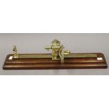 A 19th century Goodbrand and Co of Manchester brass tensile thread tester gauge. 51.5 cm long.