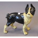 A cast iron pug dog. 25 cm high.