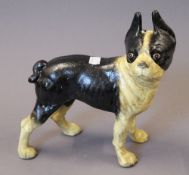 A cast iron pug dog. 25 cm high.