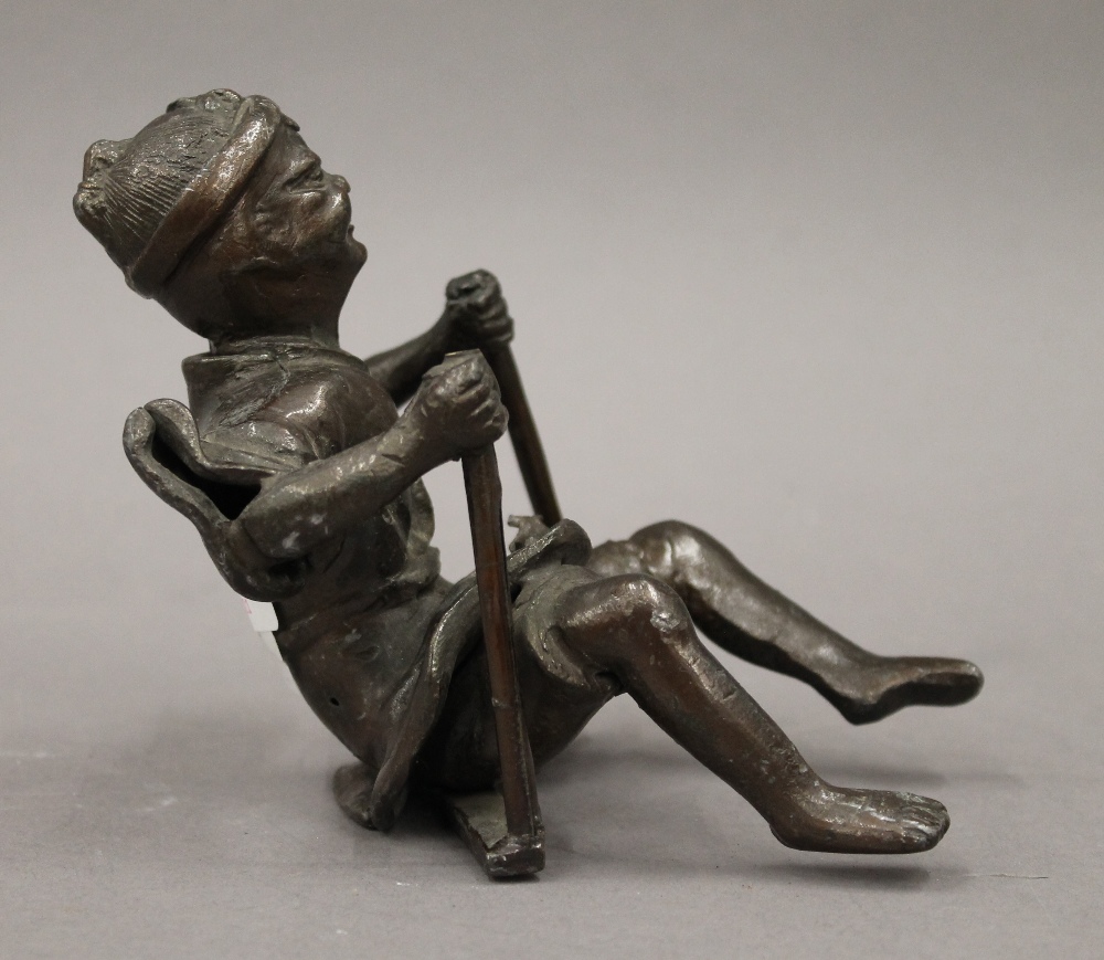 A Japanese bronzed metal figure. 18 cm high. - Image 2 of 3