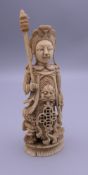 A 19th century Chinese ivory figure, probably a chess piece. 11.5 cm high.