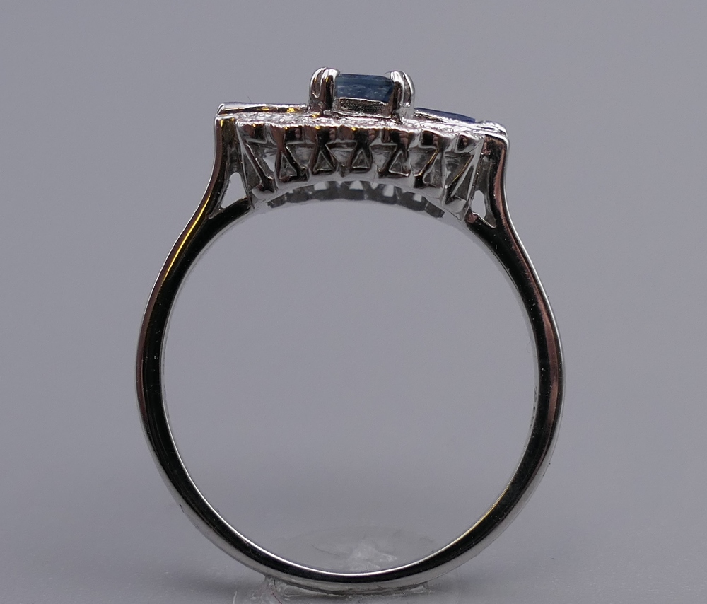 An Art Deco style 9 ct white gold sapphire and diamond ring. Ring size N/O. - Image 3 of 10