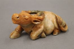 A soapstone model of a bull. 14 cm long.