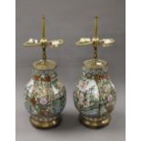 A pair of Chinese porcelain lamps. 60 cm high.