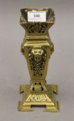 A Victorian pierced brass vase. 21.5 cm high.