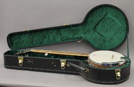 A cased banjo.