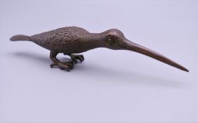 A bronze model of a humming bird. 13.5 cm long.