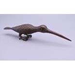 A bronze model of a humming bird. 13.5 cm long.