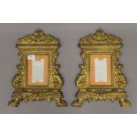 A pair of 19th century gilt bronze frames. 38.5 cm high.