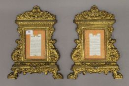 A pair of 19th century gilt bronze frames. 38.5 cm high.