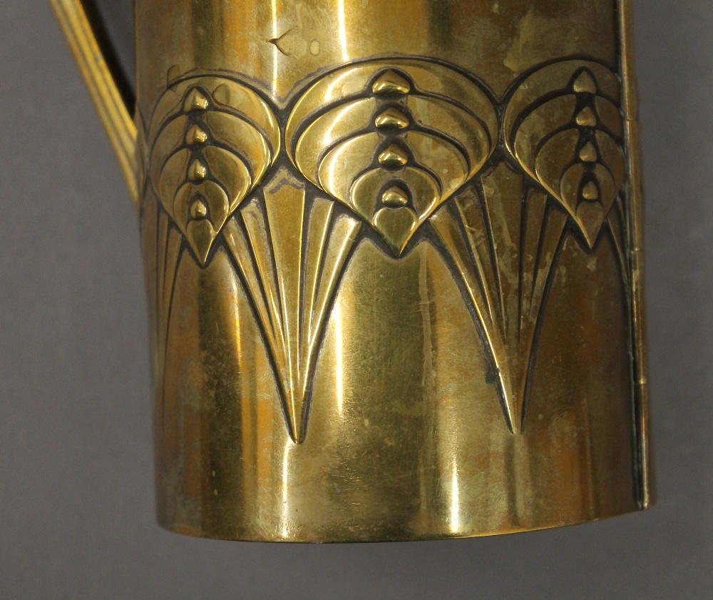 A W.M.F Arts and Crafts brass bottle cover. 29 cm high. - Bild 4 aus 5