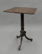 A 19th century mahogany tripod table. 43 cm wide.