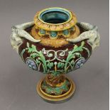 A Victorian Copeland Majolica vase. 19 cm high.