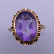 A 9 ct gold and amethyst ring. Ring size P.