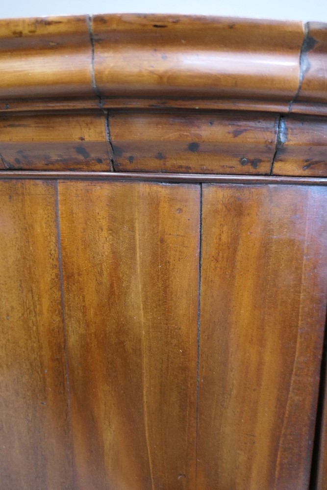 A George III mahogany bow front corner cupboard. 99 cm high. - Image 4 of 6