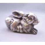 A silver rabbit, bearing Russian marks. 7 cm long.