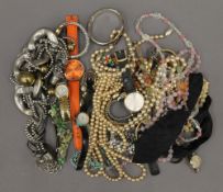A quantity of miscellaneous jewellery and wristwatches.