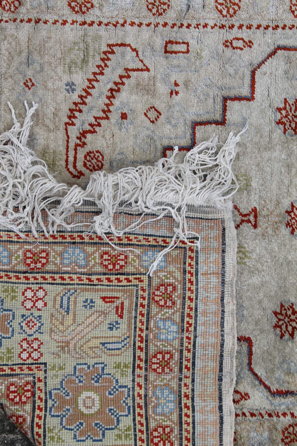 A Caucasian wool rug, 145 x 220 cm and a cream ground rug, 90 x 40 cm. - Image 5 of 6