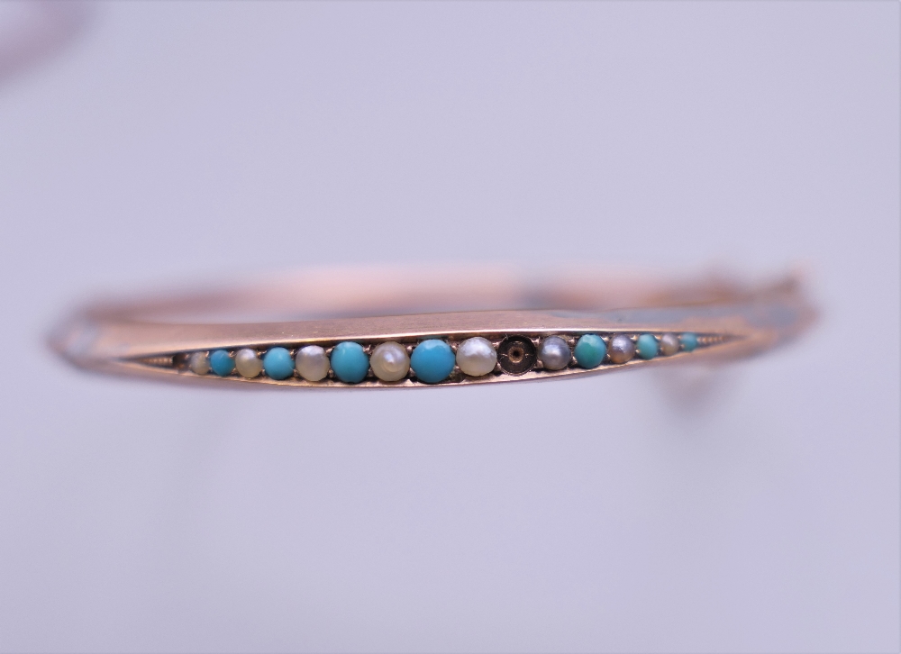 Two 9 ct gold bangle form bracelets, one set with turquoise and seed pearls. 10. - Image 3 of 5