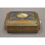 A 19th century Continental jewellery casket, the lid inset with a painted miniature, with key.