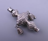 An Edwardian child's silver rattle top. 5 cm high.