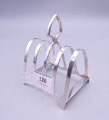 A silver toast rack. 9.5 cm high. 63.3 grammes.