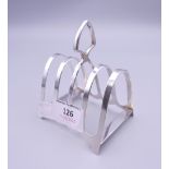 A silver toast rack. 9.5 cm high. 63.3 grammes.