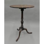 A 19th century mahogany tilt top tripod table. 48 cm diameter.
