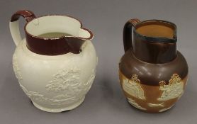 A Doulton silver rimmed harvest jug and another jug. The former 18.5 cm high.