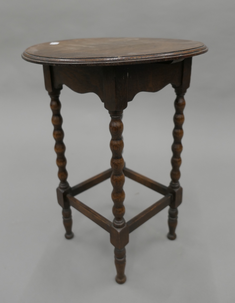 An Edwardian mahogany overmantle mirror and a small oak barley twist side table. - Image 5 of 7